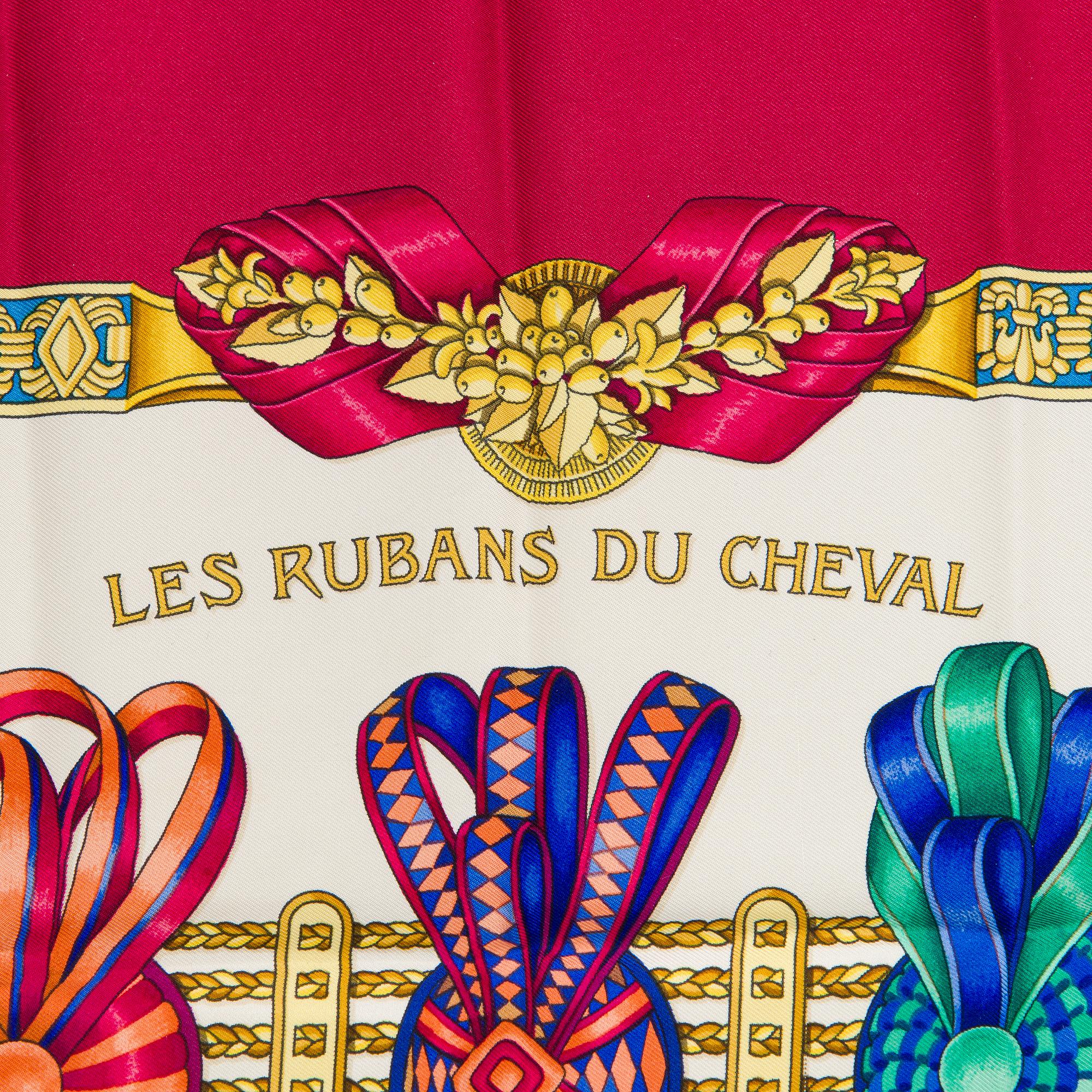 Hermès, a 'Les Rubans du Cheval' silk scarf.