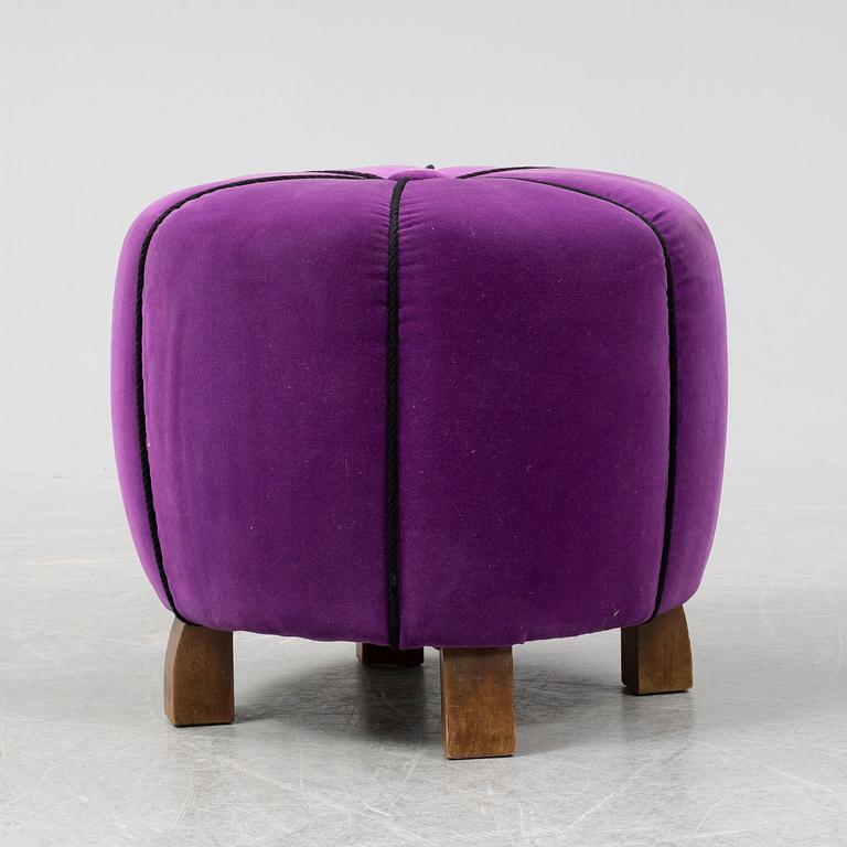 A 1940's table with pouf.
