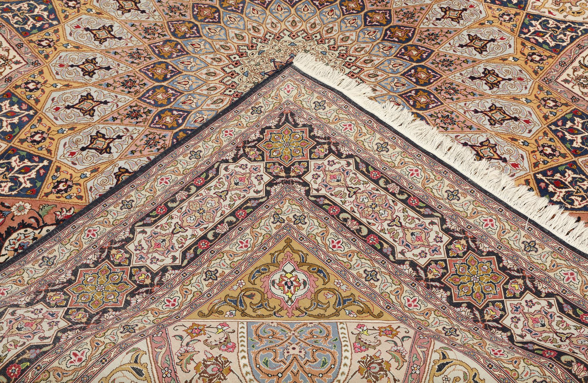 A part silk Tabriz carpet, so-called 50 Raj, approx. 266 x 248 cm.