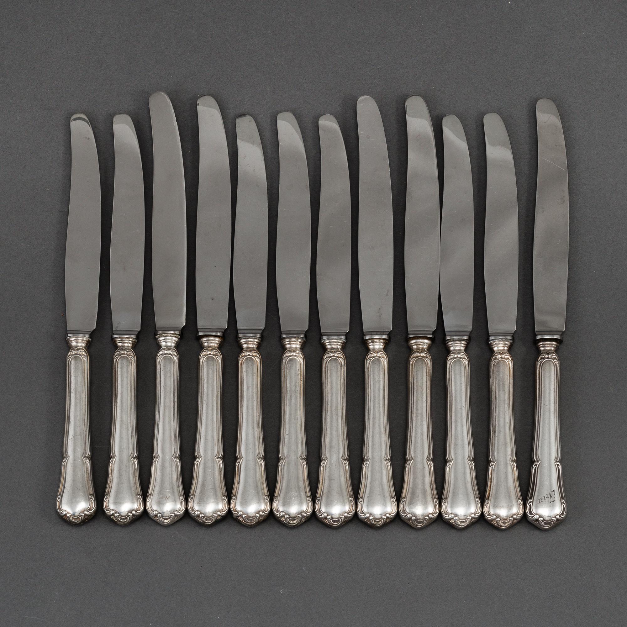 K. ANDERSSON, 12 silver knives, model 'Barock,' Stockholm.