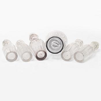 Parts for a table centrepiece, six glass bottles, and seven lids in silver, marked Pehr Zethelius, Stockholm 1807.