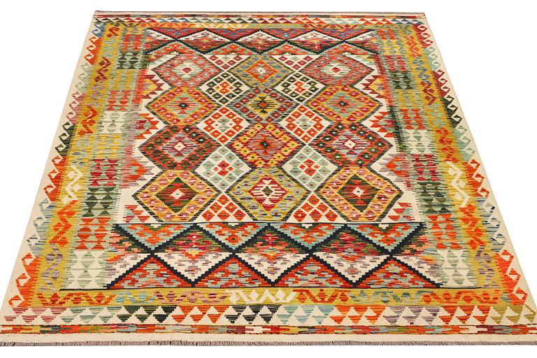 A Kilim carpet, c. 251 x 198 cm.