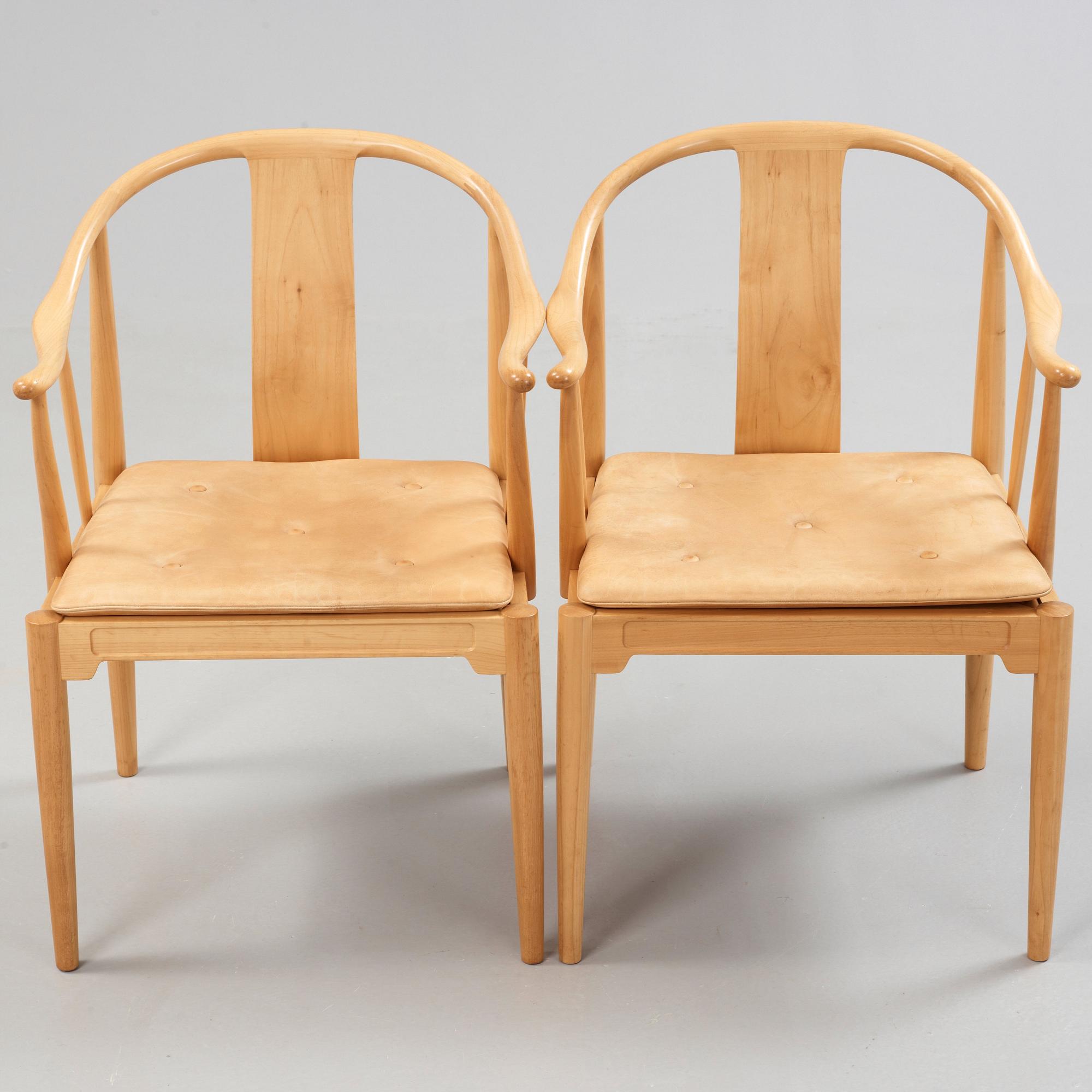 A pair of Hans J Wegner 'China chairs', Fritz Hansen, Denmark 1986-87.