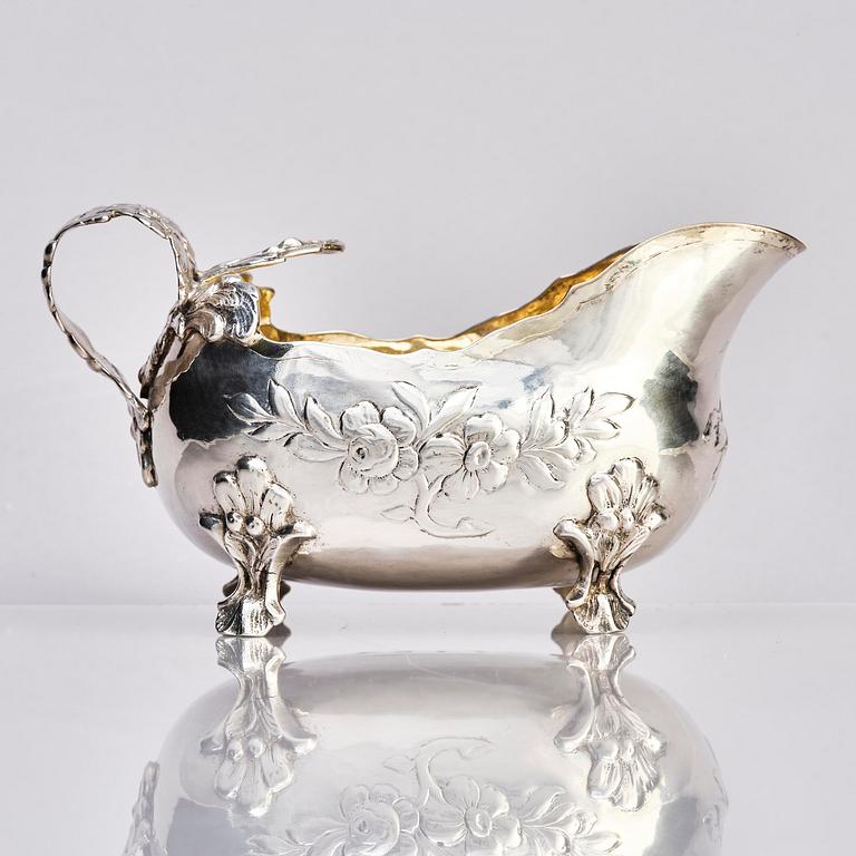 A Swedish mid- 18th century parcel-gilt silver cream-jug, mark of Anders Schotte, Uddevalla 1776.