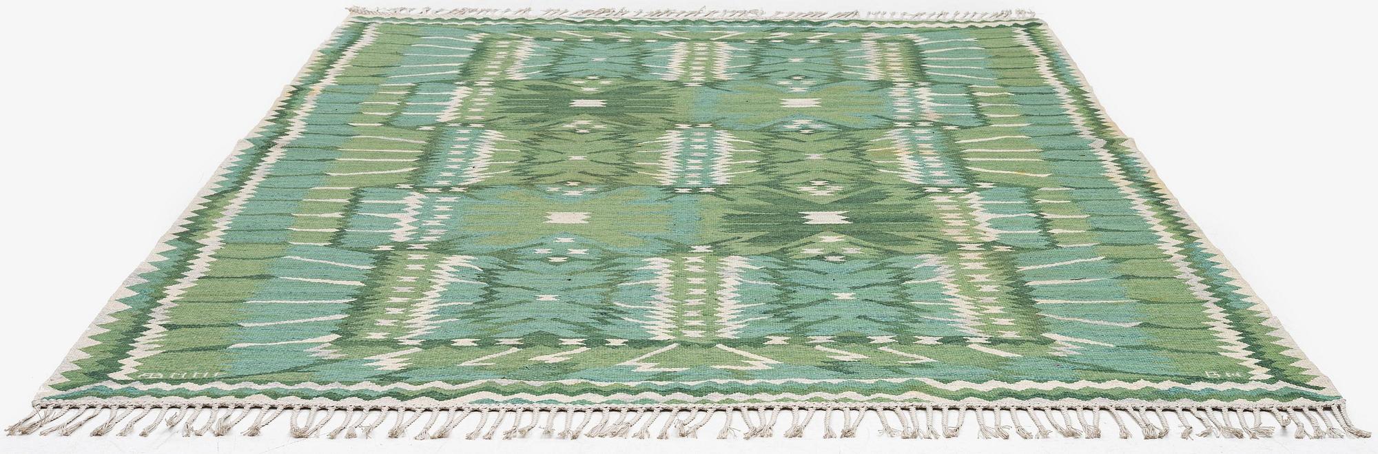 Barbro Nilsson, a carpet, 'Strålblomman grön', tapestry weave, c. 316 x 232 cm, signed AB MMF BN.