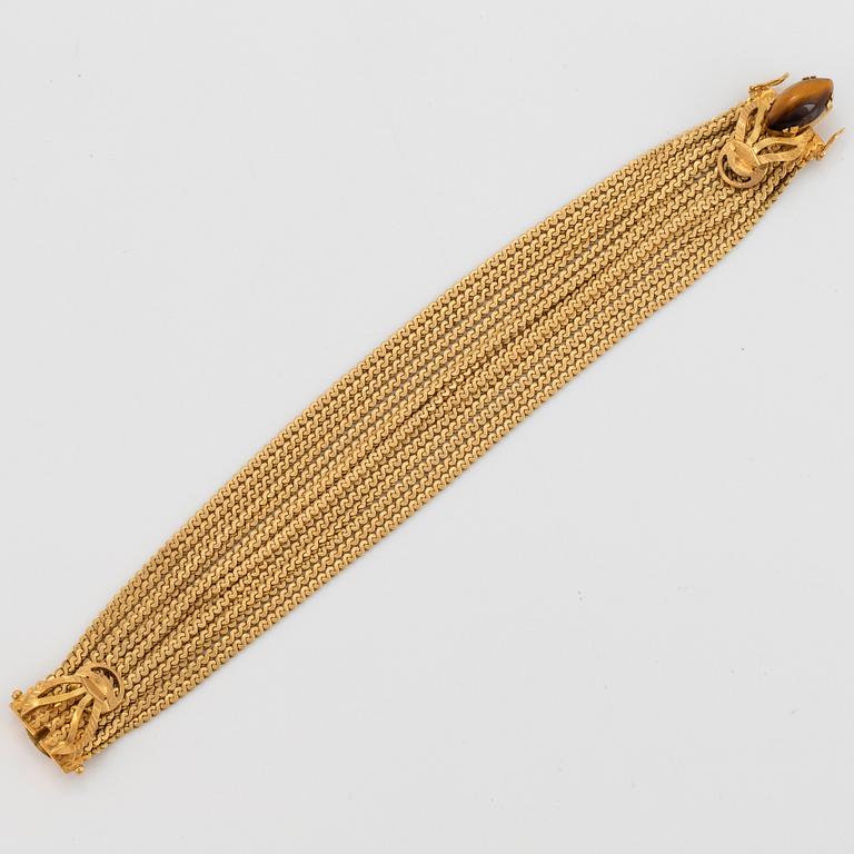 Armband 18K guld med kvarts-kattöga.