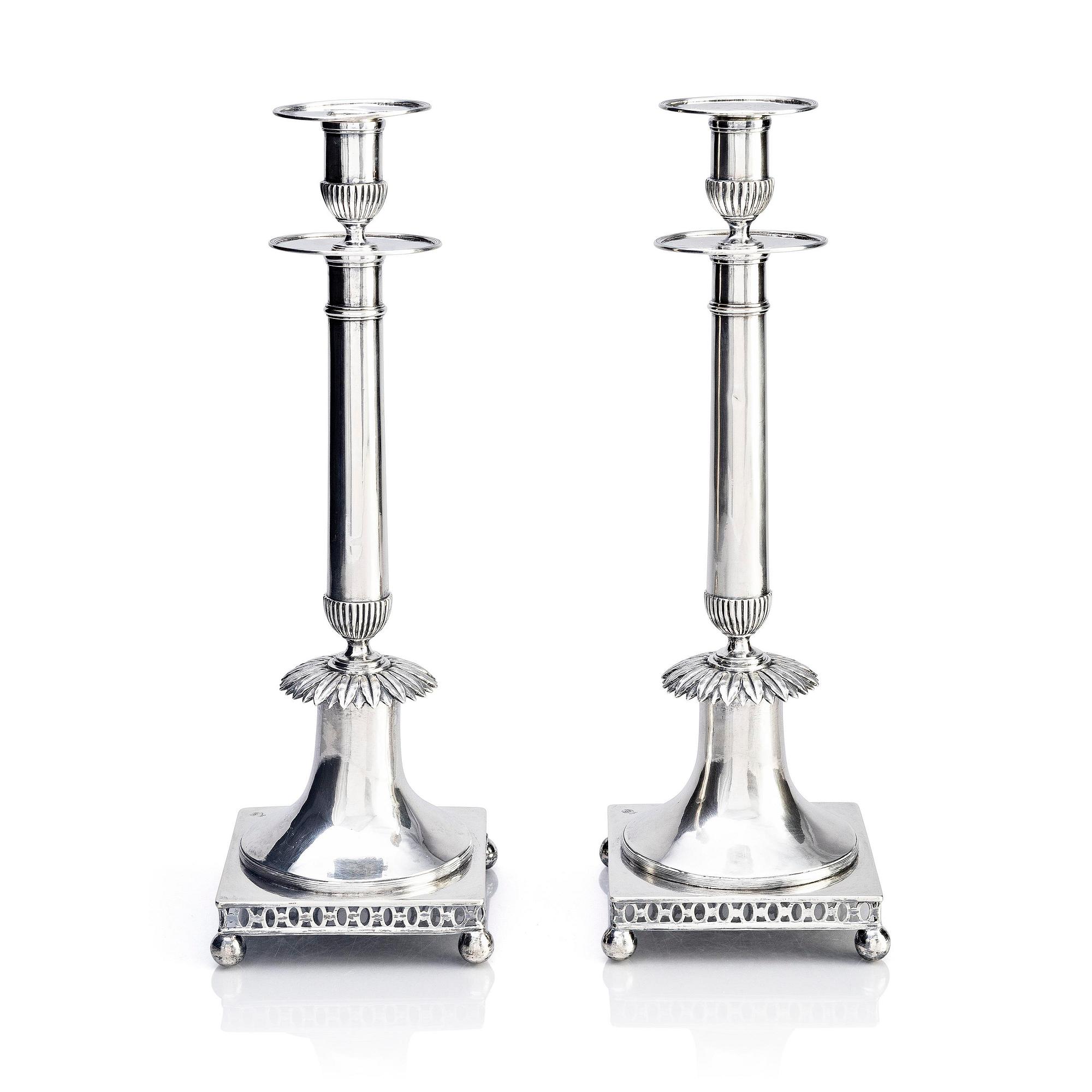 A pair of Swedish early 19th century silver candlesticks, marks of Johan Petter Grönvall, Stockholm 1815.