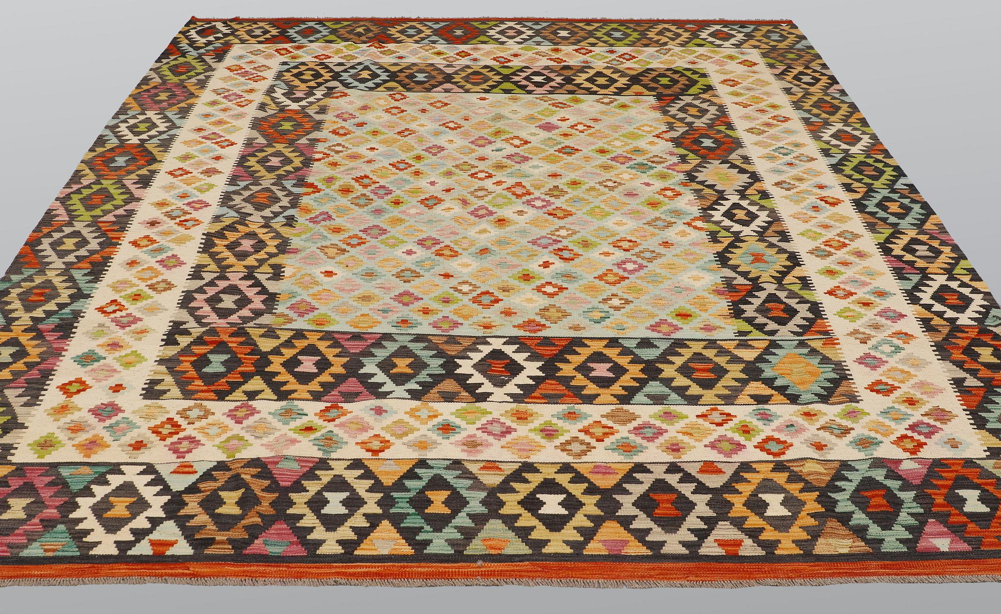 A carpet, Kilim, ca 304 x 263 cm.