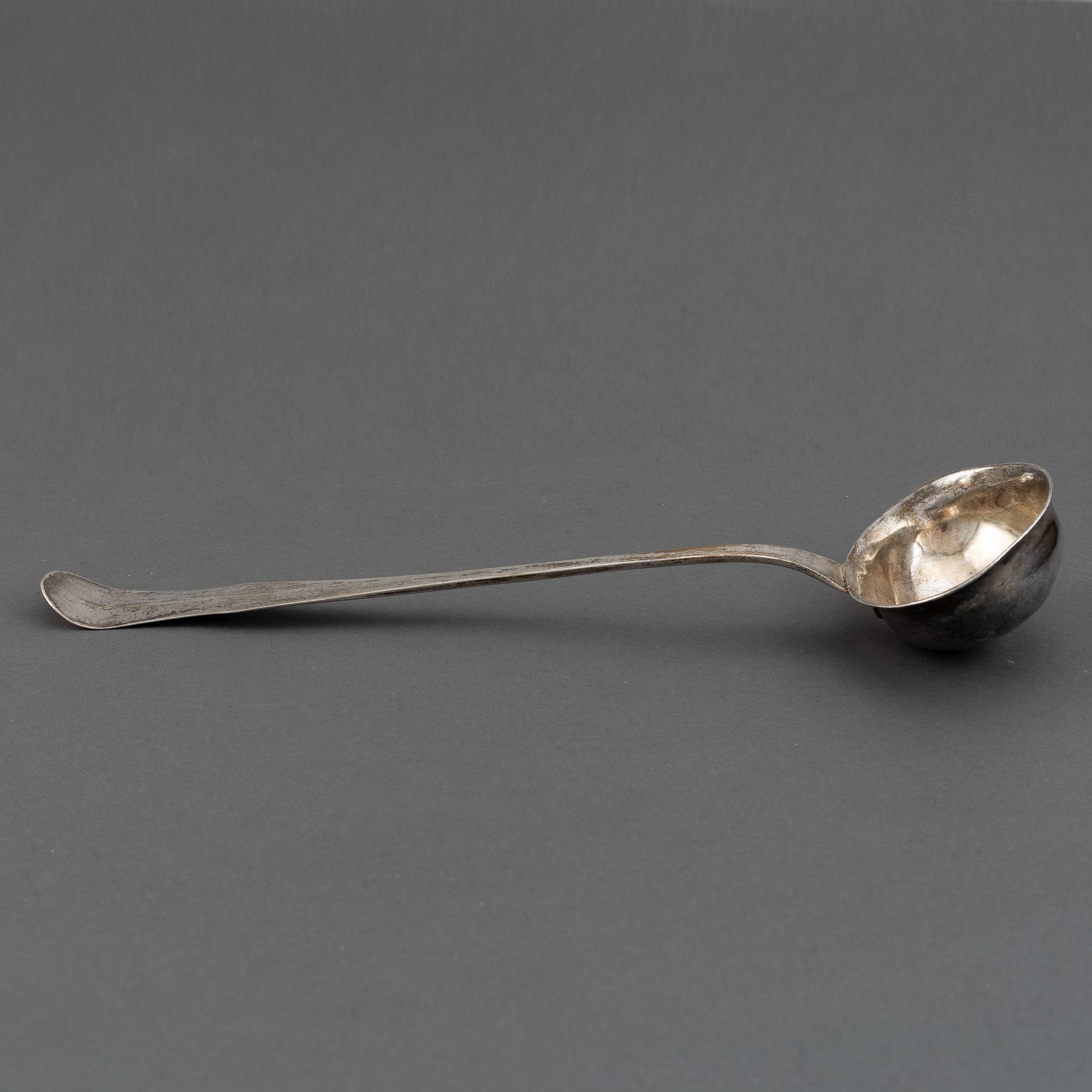 A Swedish 19th century silver soupe-laddle, marked Gustaf Bergendorff, Karlskrona 1811.
