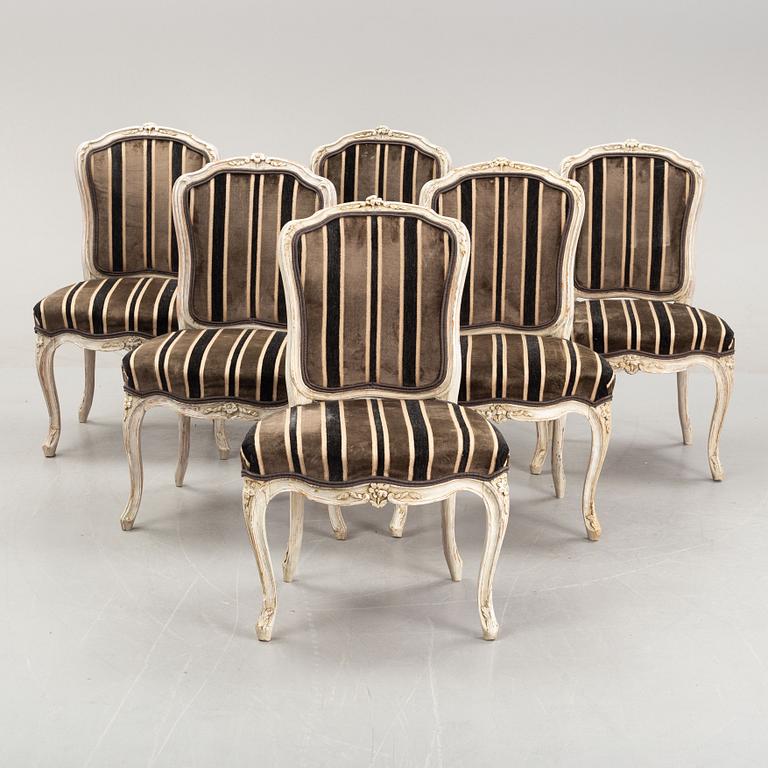 A matched set of six painted french rococo chairs, mid 18th Century.