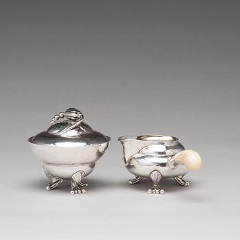 Georg Jensen, a "Blossom" sugarbowl and creamer, Copenhagen 1919-21, 830/1000 silver.