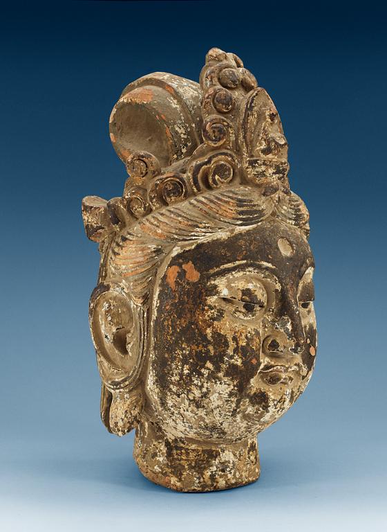 A Yuan/Ming style sculptured and painted wood head of Bodhisattva Guanyin, possibly Ming dynasty (1368-1644).