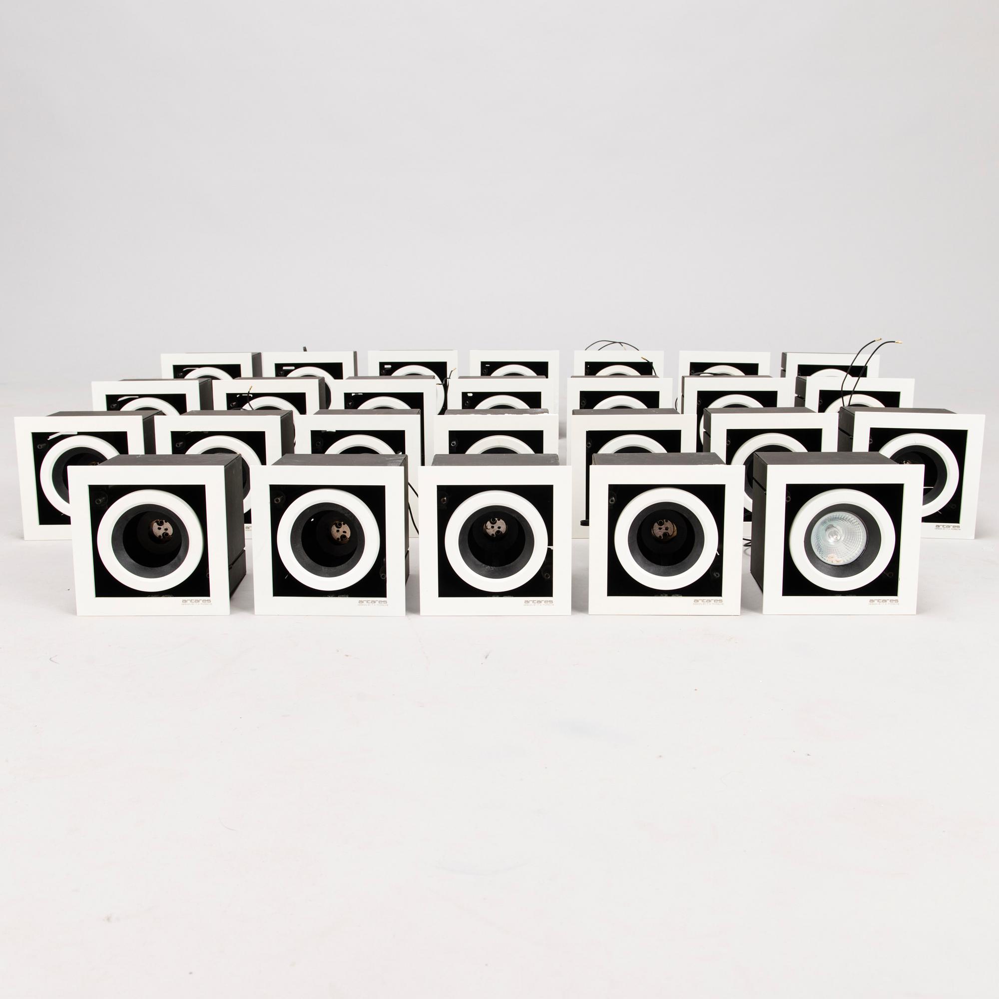 A set of 26 "Antares" spotlights by Flos, designed by F. A. Porsche, 2010s.