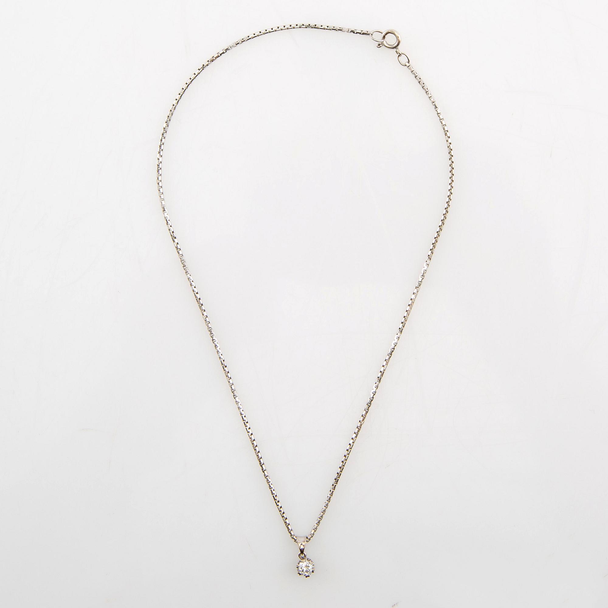 Halsband 18K vitguld med en rund briljantslipad diamant.