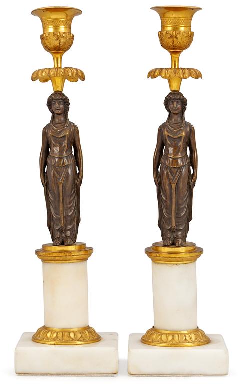A pair of late Gustavian candlesticks.