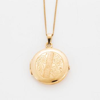 18K gold locket, with chain.