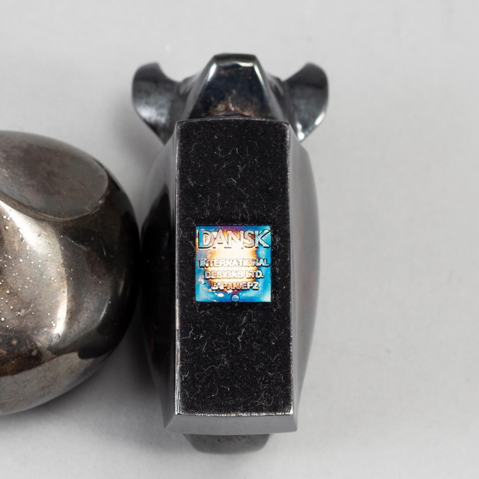 Two electro plated zinc figurines from Dansk Designs, Japan.