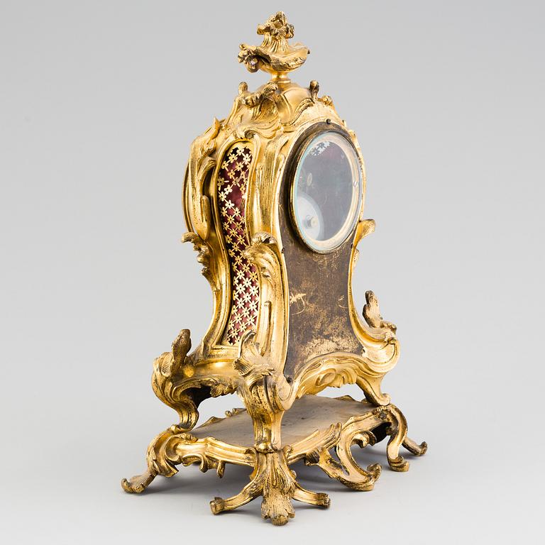 A Louis XV 18th century gilt bronze mantel clock.