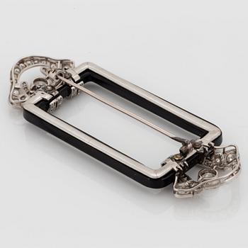 Janesich Art Deco brosch med onyx och gammal- och åttakantslipade diamanter.