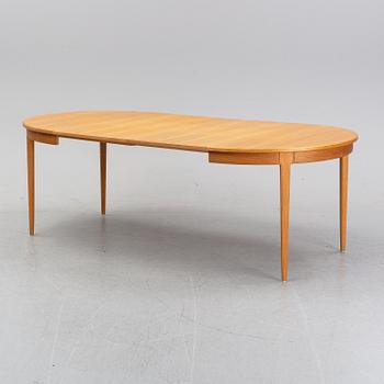 An oak dining table and four chairs by Carl Malmsten for Bodafors. Second half of the 20th Century.