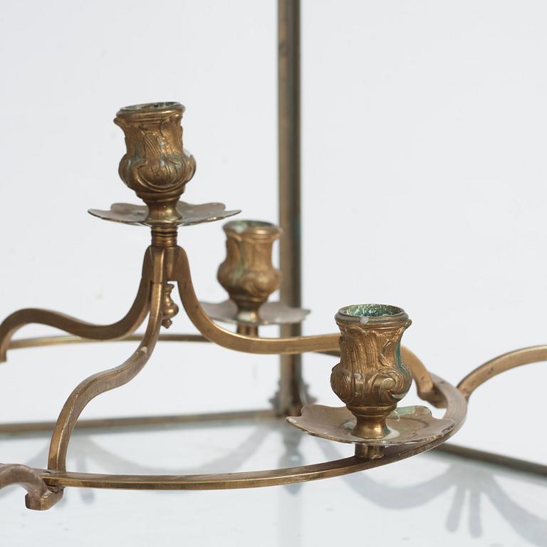 A Swedish rococo gilt-brass four-light lantern, possibly a masterpiece, Stockholm, later part of the 18th century.