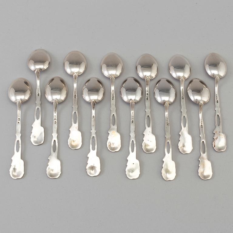 12 silver coffee spoons, import marks for Malmö, Sweden, 20th century. Weight ca 123 grams.