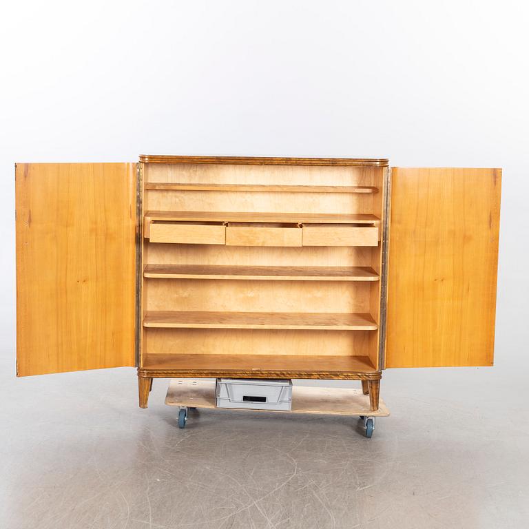 An 1940:s birch and beech cabinet 'Haga'.