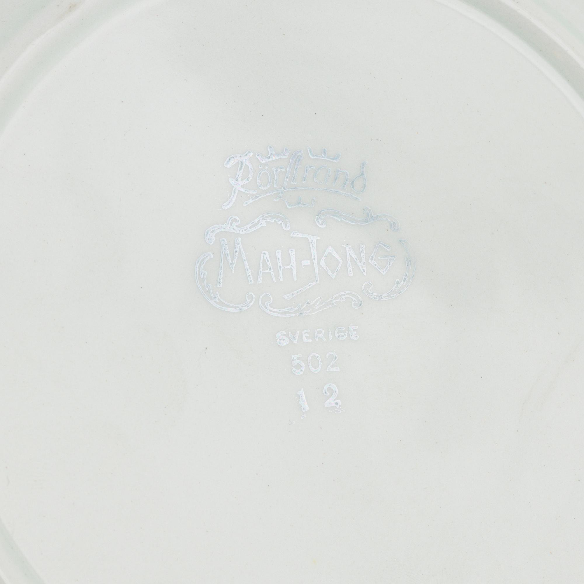 A 45-piece 'Mahjong' creamware dinner service, Rörstrand, first half of the 20th century.