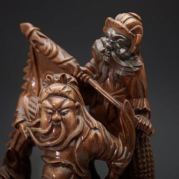 A large wooden sculpture group of Guandi on horseback and an attendant, Qing dynasty (1644-1912).