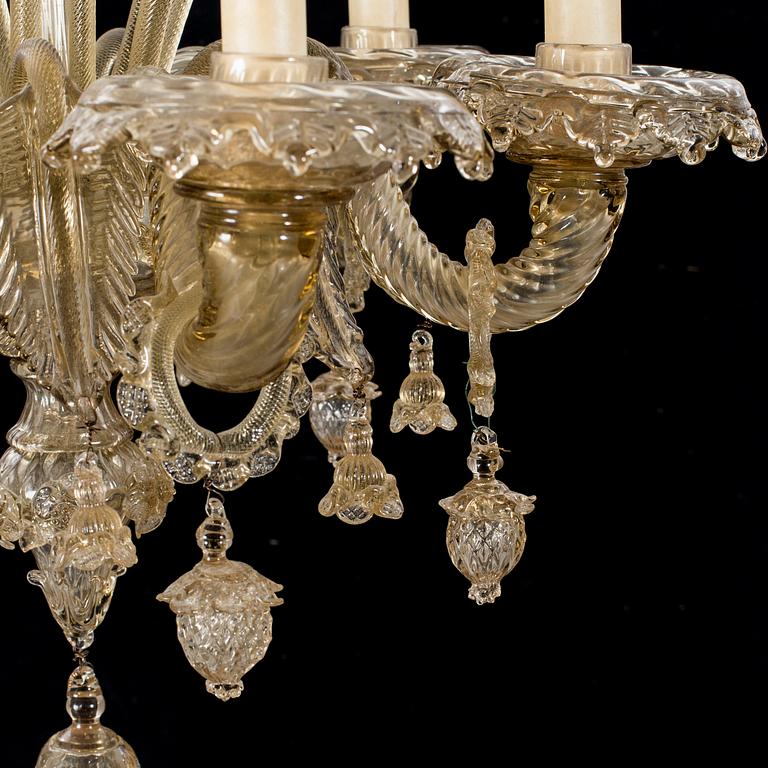 A 20th century six light Venetian style glass chandeliere.