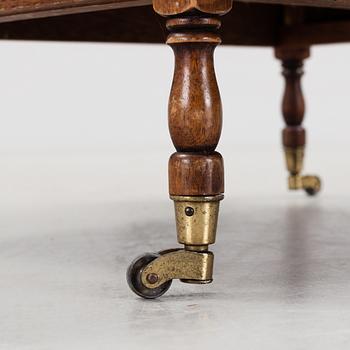 A mahogny newspaper stand (so called Canterbury), England, late 20th century.