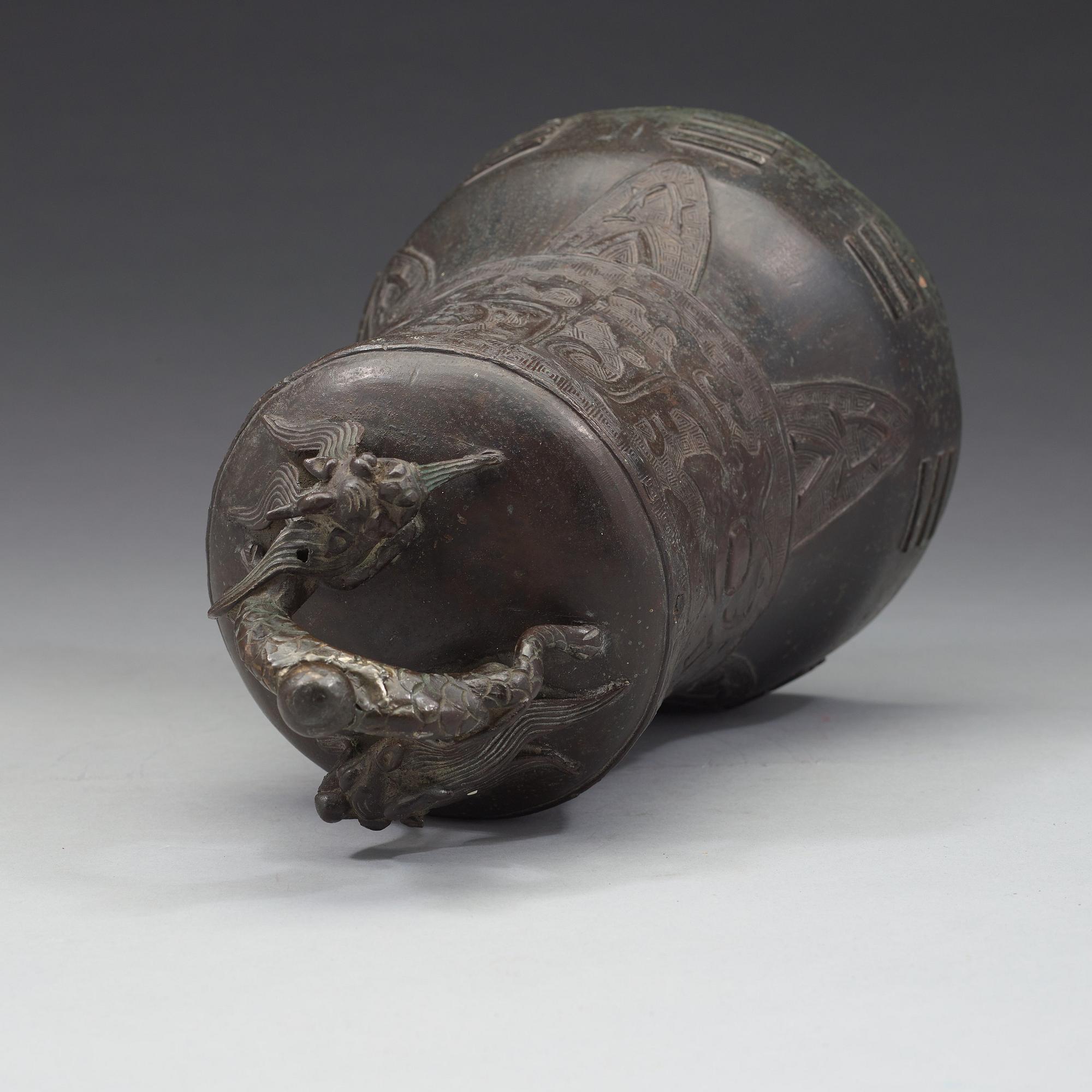 A bronze temple bell, Ming dynasty (1368-1644).