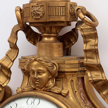 A Louis XVI 18th century gilt bronze wall clock by George Causard, Paris 1770-89.