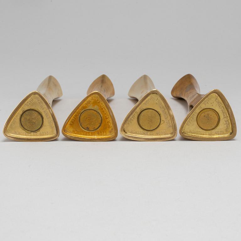 Four brass candle sticks by Karl Erik Ytterberg, 1960's.