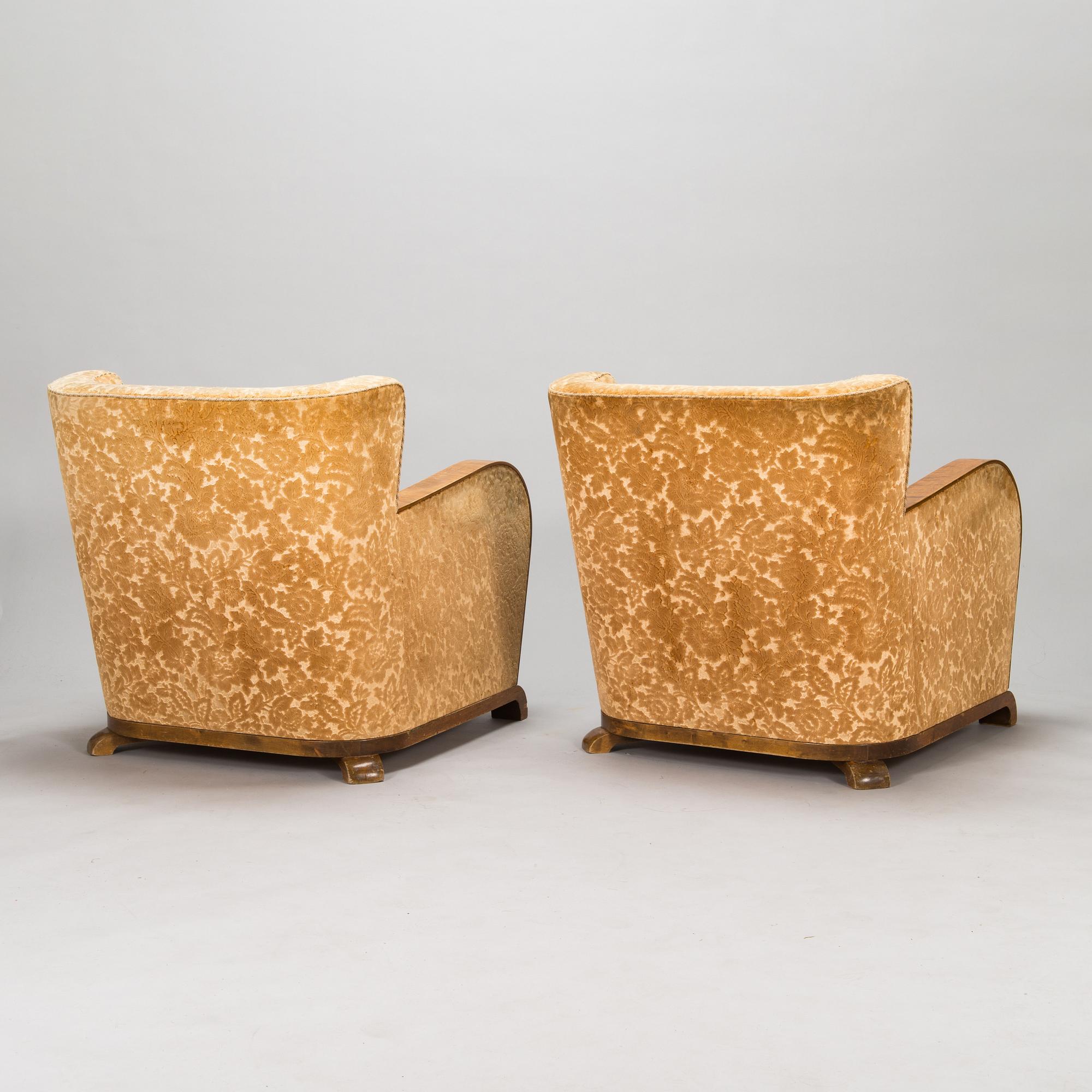 A pair of 1930's armchairs.