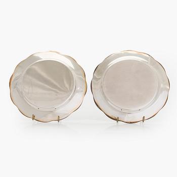 A 10-piece set of silver chargers, Kultateollisuus, Turku 1938 and 1980.