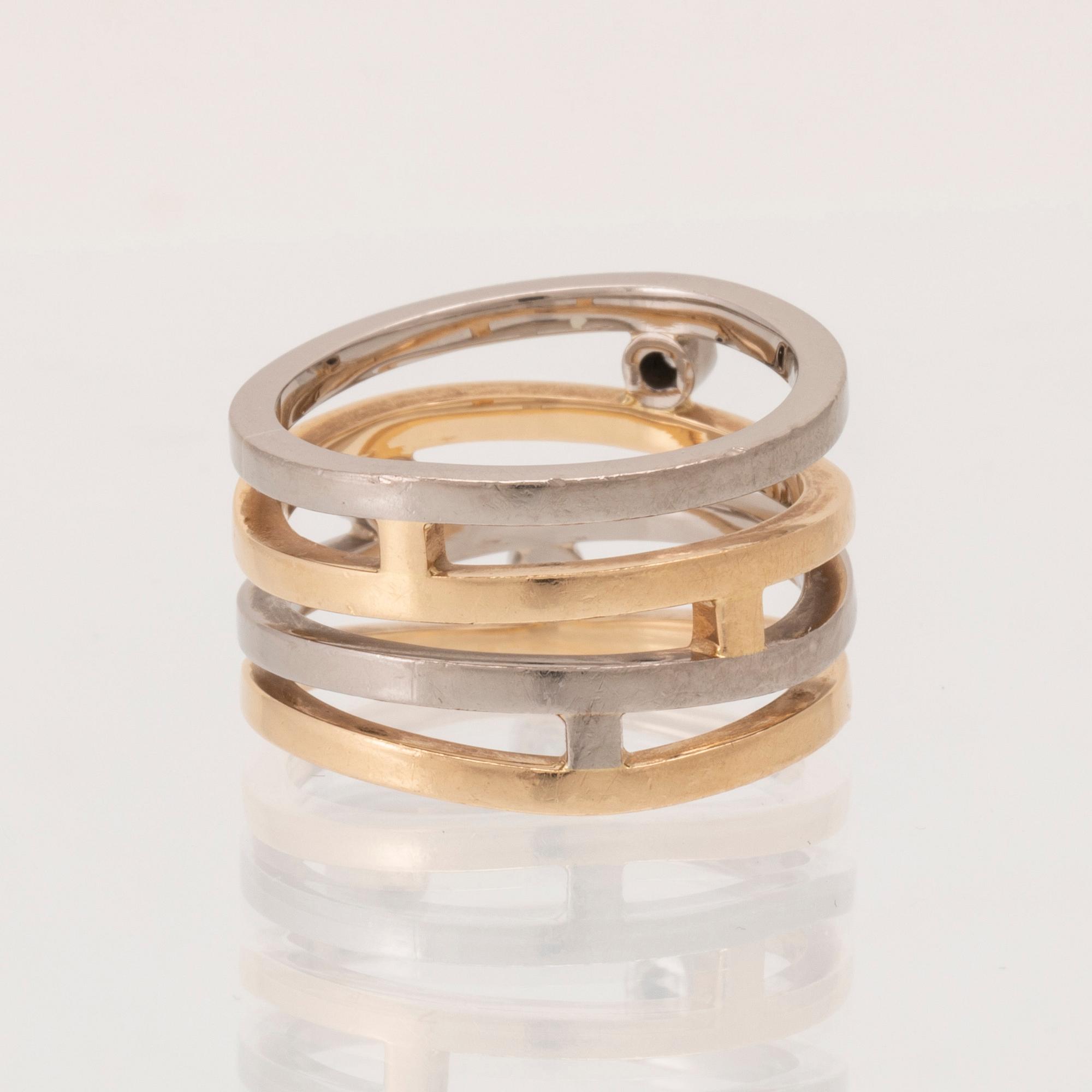 Ring 18K vitt och rött guld med runda briljantslipade diamanter, Björn Nilsson Kristianstad 2006.