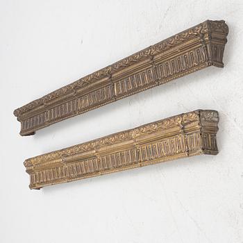 Two repousse-brass cornices, circa 1900.