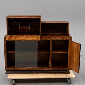 A walnut veneered cabinet, 1930's.
