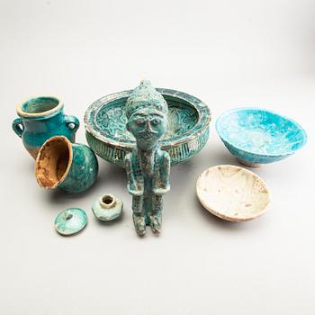 A group of turkoise glazed Persian objects.