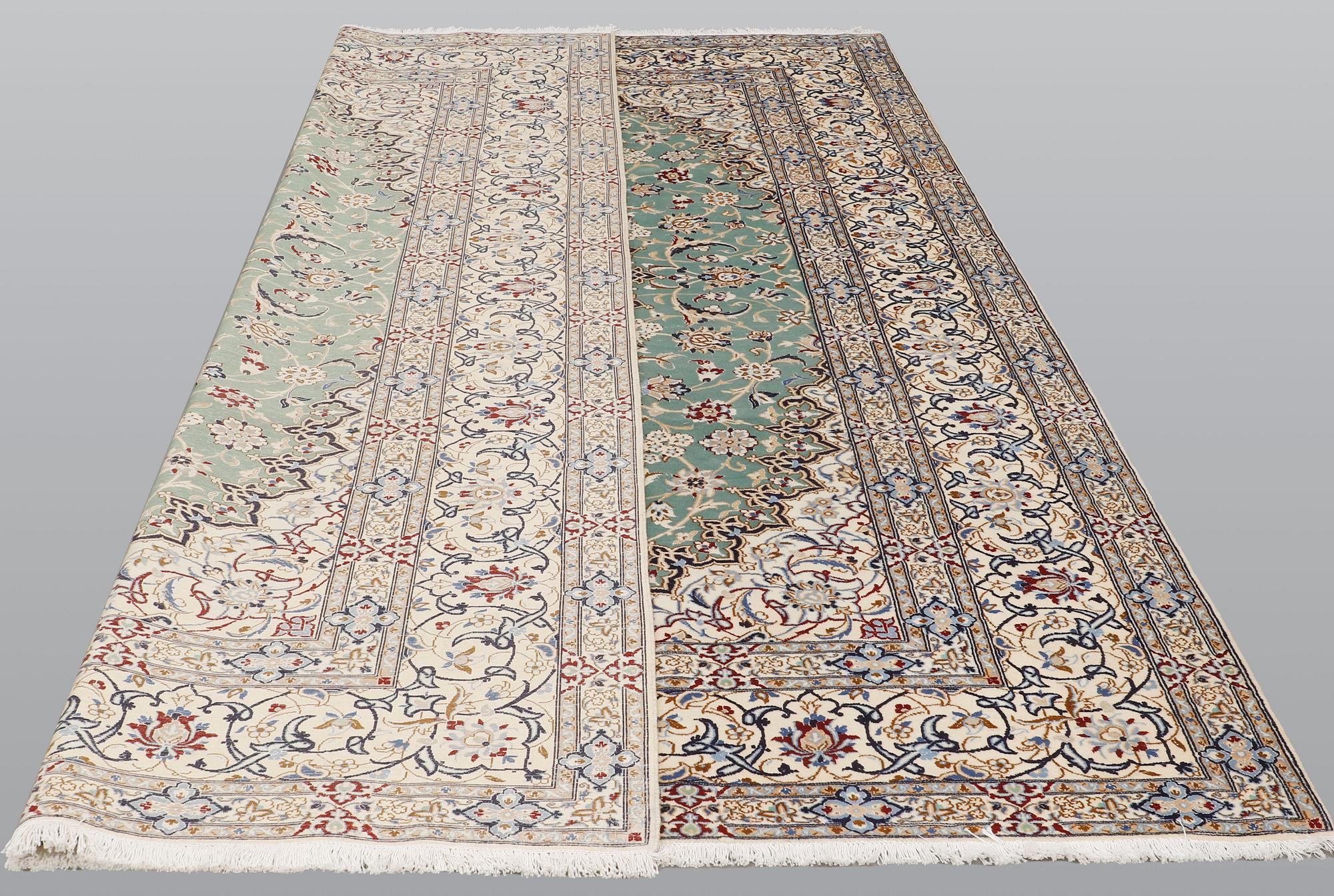A carpet, Nain, Part Silk, sk 9LAA, 353 x 250 cm.