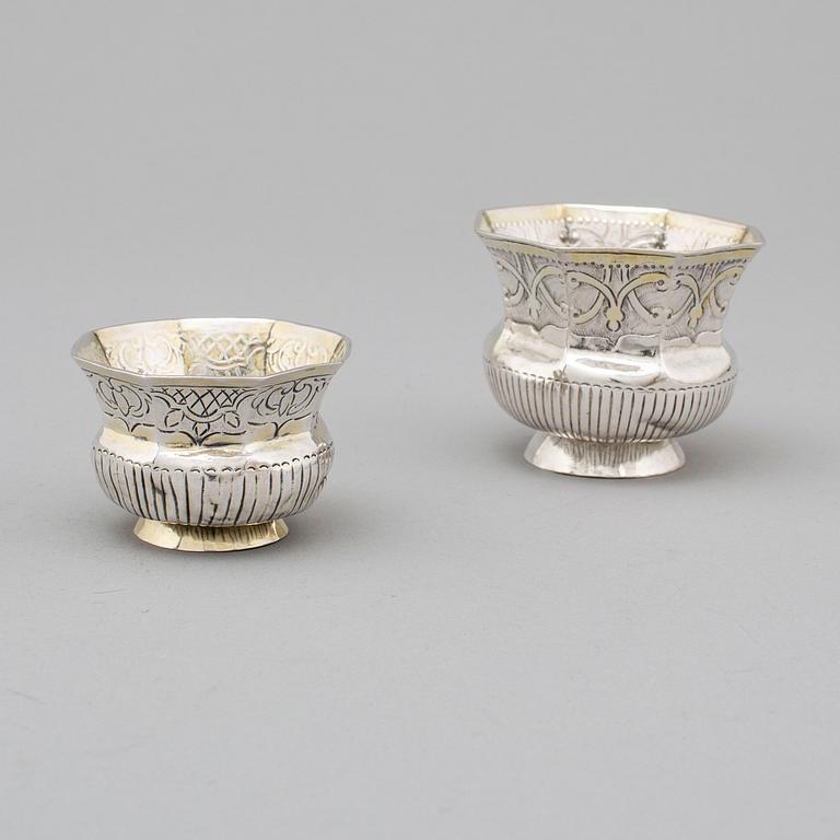 Two Russian 18th century parcel-gilt silver charkas, unidentified makers marks, Moscow.