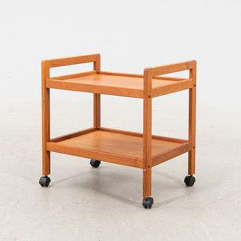 A teak serving trolley from the middle of the 20th century.