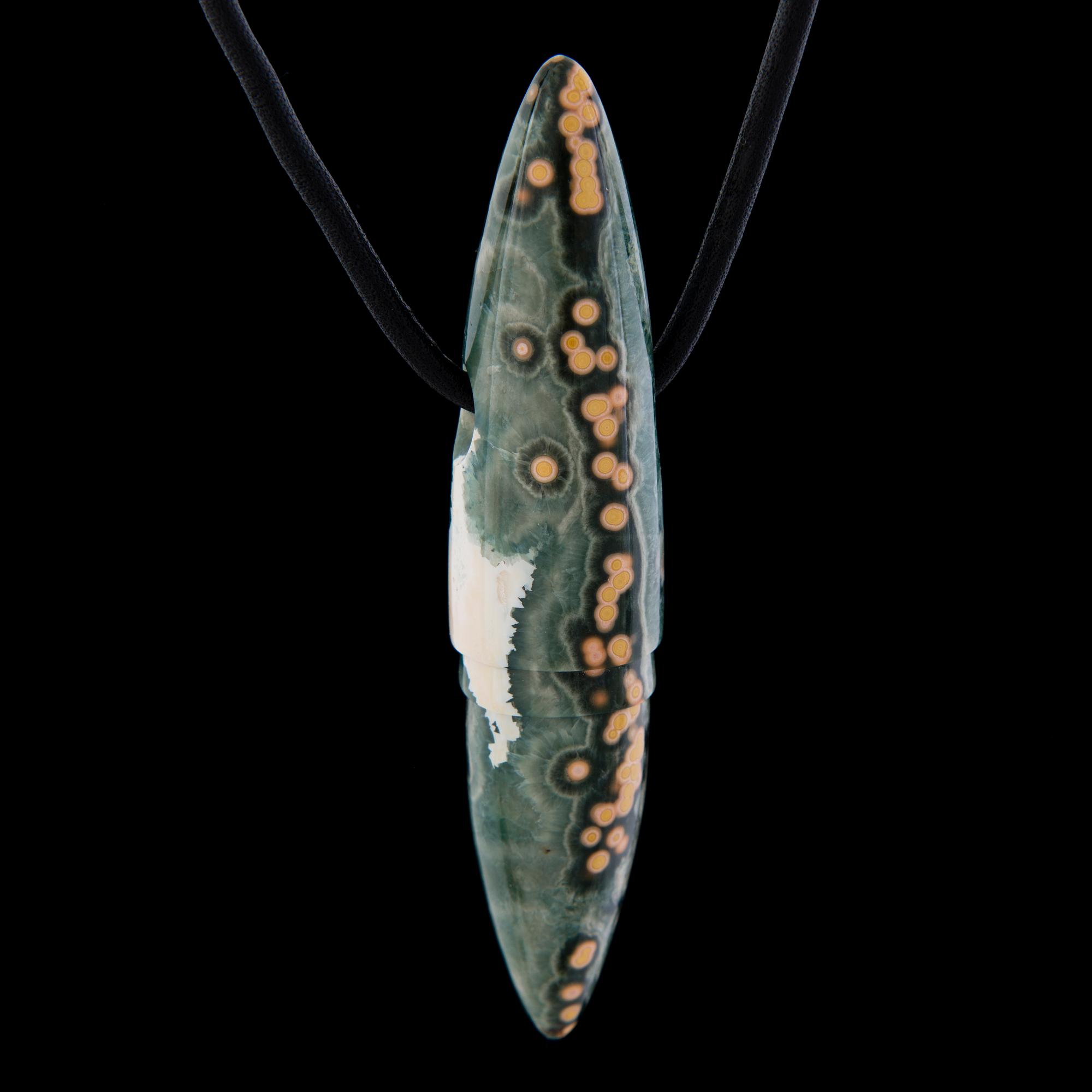 A BERND MUNSTEINER PENDANT, "Symbolon", cut jasper, leather.