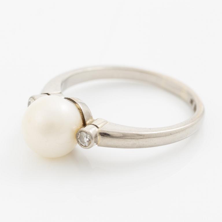Ring 18K vitguld men en pärla och gammalslipade diamanter.