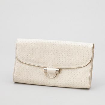 1268. A white leather clutch by Yves Saint Laurent.