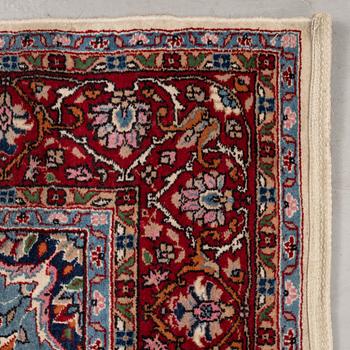 A rug, an Old Oriental,  ca 187,5 x 127 cm.