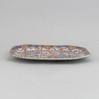 A blue and white 'Clobbered' serving dish, Qing dynasty, Qianlong (1736-95).