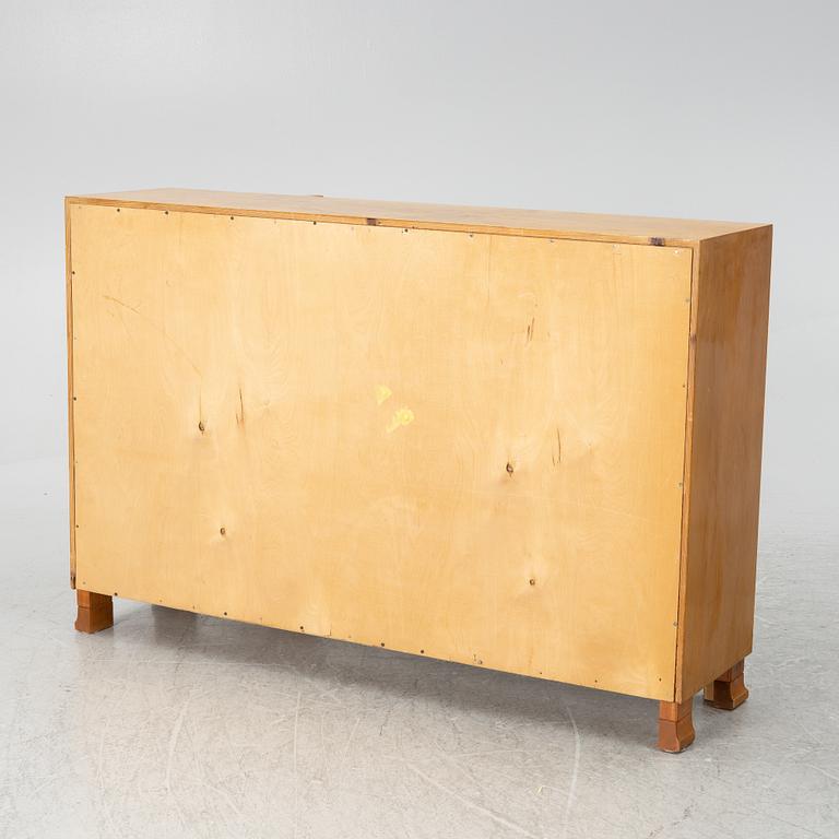 A bookcase with cabinet, 1930's.