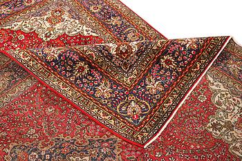 A Tabriz carpet, c 295 x 198 cm.
